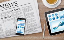 newspaper, cell phone, and tablet
