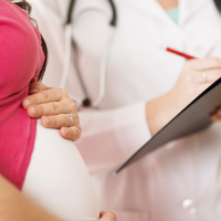 Pregnant person at doctor's visit