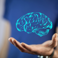 drawing of a brain floating above a hand