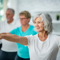 Four adults doing tai chi