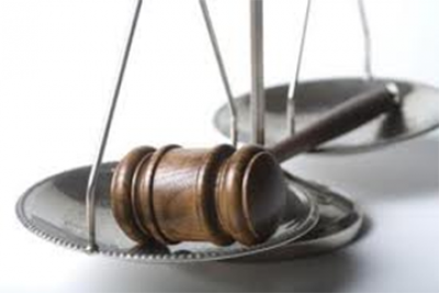 A Gavel in a Scale of Justice
