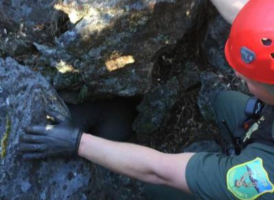 Rescuing a man from a hole near Weed