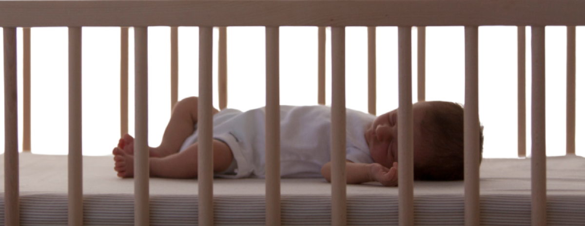 baby sleeping in crib