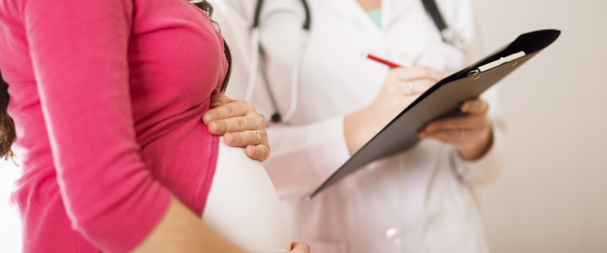 Pregnant person at doctor's visit